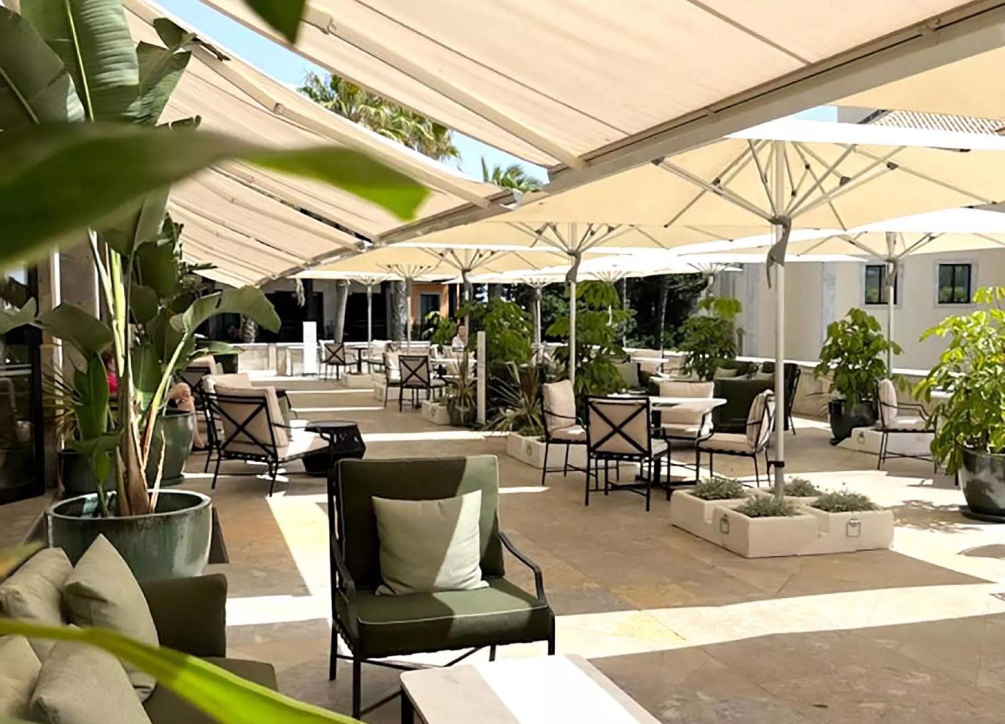 Grande Real Villa Italia Hotel & Spa Cascais Bagian luar foto The patio at the Hotel de la Paix